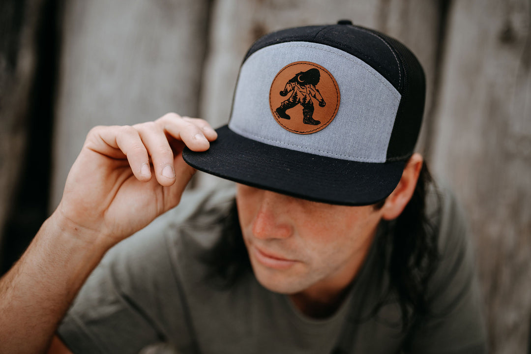 Nature Sasquatch Flat Brim 7 Panel Trucker Hat - Black/Grey